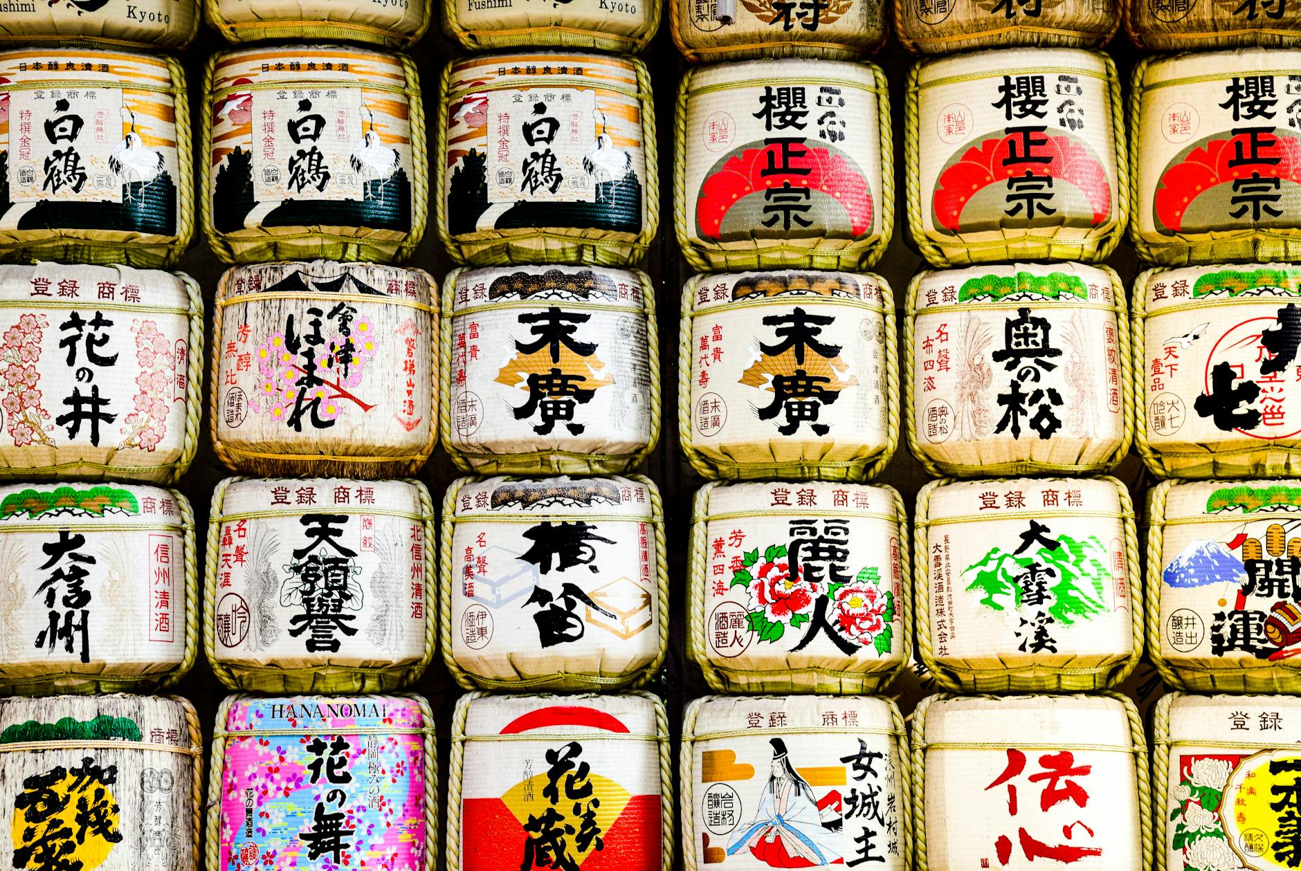 Colorful sake barrels at Tokyo's Meiji Jingu shrine, a traditional Japanese landmark.