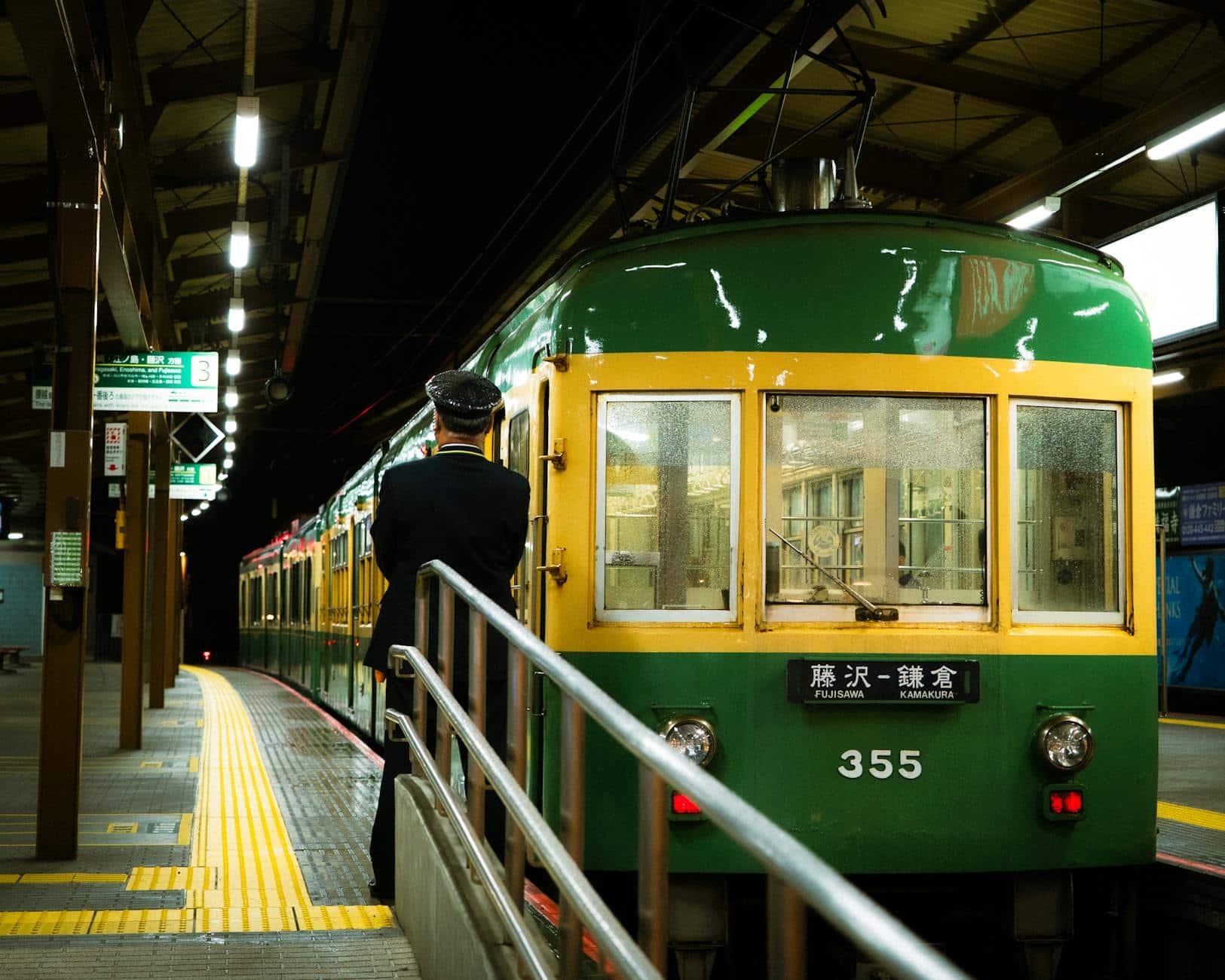 Enoden train at Kamakura station in Japan at night. Perfect capture of local transportation and cultural scenery.
