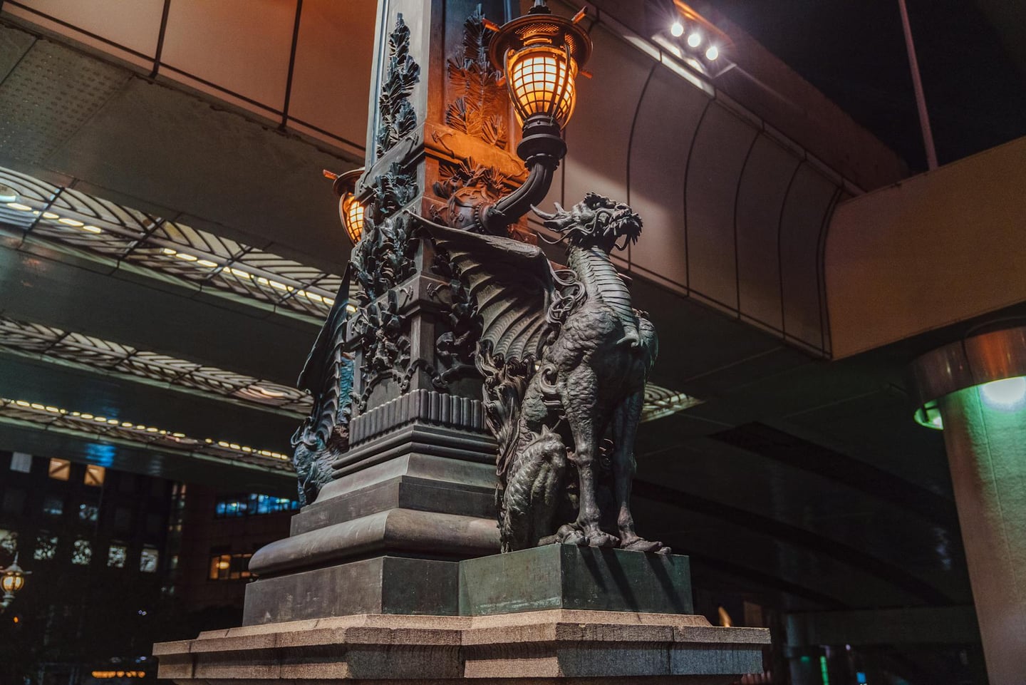 Illuminated Nihonbashi Kirin statue under the bridge in Chuo City, Tokyo.