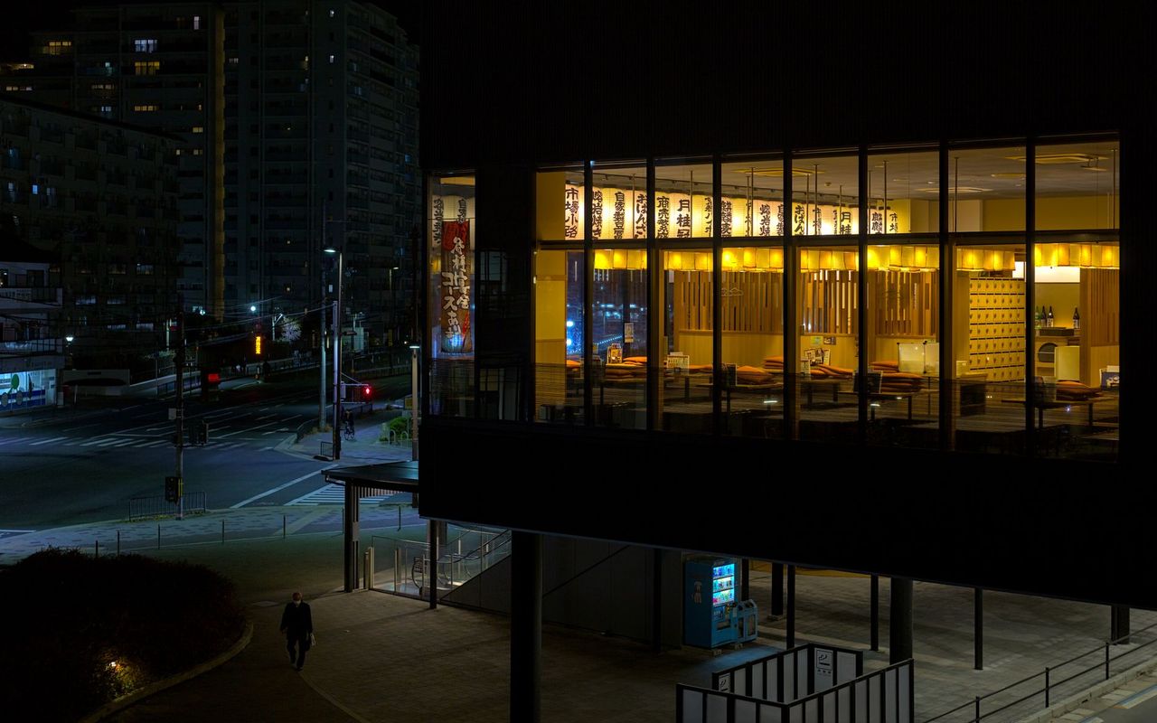 A Japanese restaurant on a Kyoto street at night